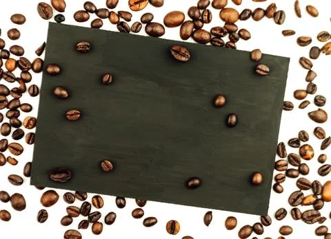 Rectangular board with place for text and with coffee beans on white isolated Stock Photos