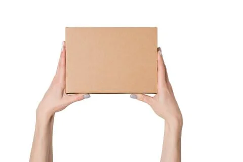 Rectangular box in female hands. Top view. Isolate Stock Photos