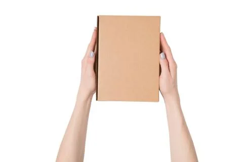 Rectangular box in female hands. Top view. Isolate 스톡 사진