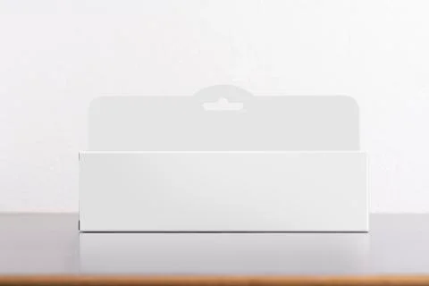 Rectangular box package mockup with hanger on table mock-up series Stock Photos