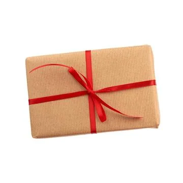 Rectangular box wrapped in brown paper and tied with a red bow, gift isola... Stock Photos