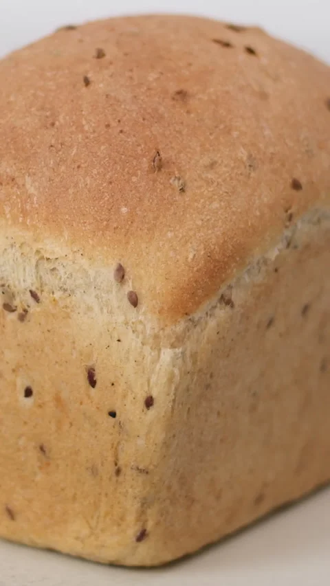 Rectangular bread swirls on a plate. Close-up slider shot of freshly baked 動画素材 308793314
