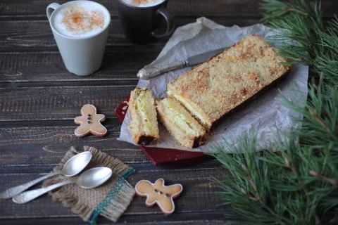 Rectangular cake is a breakdown on wooden background Stock Photos