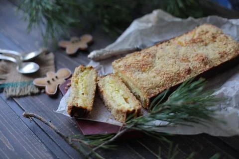 Rectangular cake is a breakdown on wooden background Foto stock