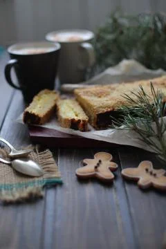 Rectangular cake is a breakdown on wooden background Foto stock