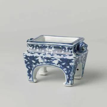 Rectangular censer on four legs with dragons. Rectangular porcelain incens... Stock Photos