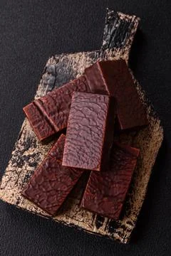 Rectangular chocolate candies with mousse and waffles Stock Photos