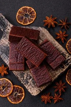 Rectangular chocolate candies with mousse and waffles 스톡 사진