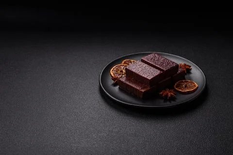 Rectangular chocolate candies with mousse and waffles Stock Photos