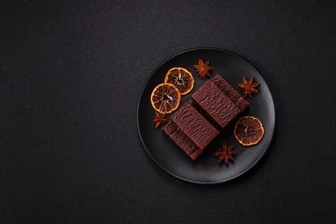 Rectangular chocolate candies with mousse and waffles 스톡 사진