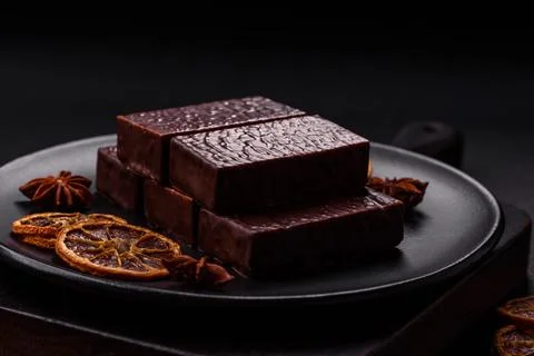 Rectangular chocolate candies with mousse and waffles 스톡 사진