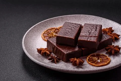 Rectangular chocolate candies with mousse and waffles Stock Photos