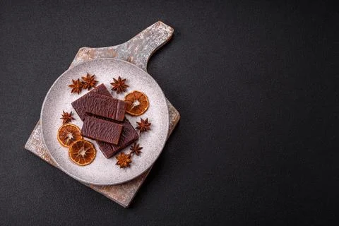 Rectangular chocolate candies with mousse and waffles Foto stock