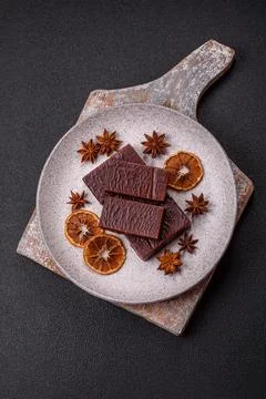 Rectangular chocolate candies with mousse and waffles Stock Photos