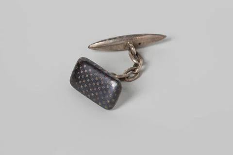 Rectangular cufflink from Niello silver with block pattern. Rectangular cu... Stock Photos