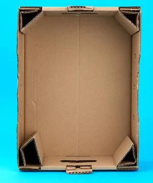 Rectangular empty cardboard box of brown paper on a blue background rectan... 스톡 사진
