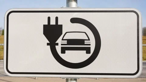 Rectangular EV Charging Station Sign with Black Plug-In Car Symbol on White Vídeos de archivo 303966836