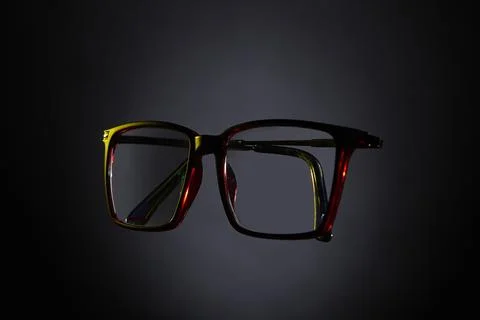 Rectangular eyeglasses on dark studio background front view Stock Photos