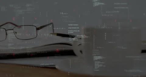 Rectangular eyeglasses resting atop wooden desk being overlaid with C++ code and 库存影片 307448465