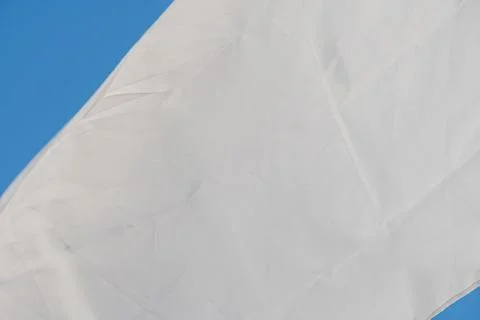 A rectangular flag, predominantly filling a low-angle frame against an expans Stock Photos