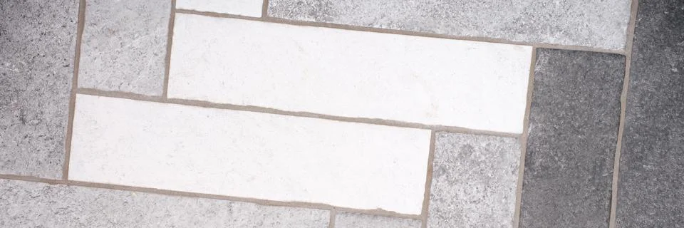 Rectangular floor tiles in white and gray tones Stock Photos
