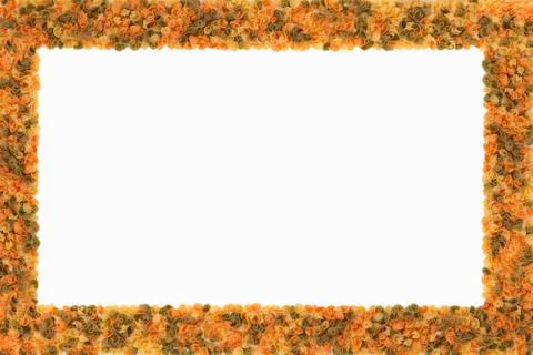 Rectangular frame made of different colored pasta Stock Photos