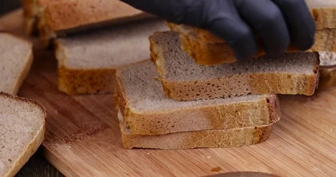 Rectangular fresh and soft bread on the table, a loaf of wheat and rye flour Stock Footage 265567392