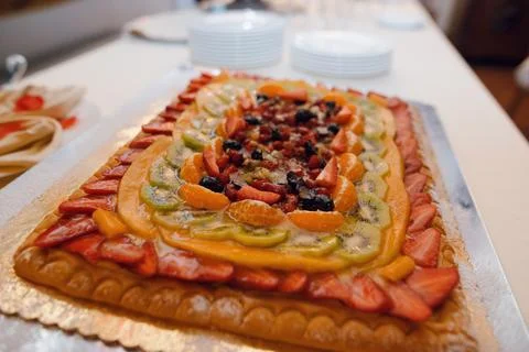 Rectangular fruit tart with strawberries, kiwi, mandarin oranges, and berri.. Stock Photos
