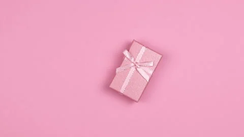 Rectangular gift box pink rotation Stock Footage 143137309