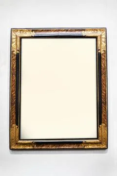 Rectangular glossy wooden frame on a gray background, mockup for your ad an.. 스톡 사진