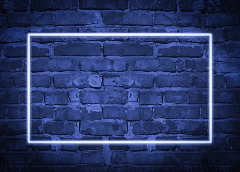 Rectangular glowing blue neon frame on brick wall background, place for inscr Stock Photos