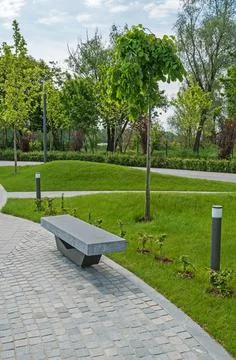 Rectangular granite bench in the city park Stock Photos
