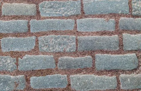 Rectangular gray stone granite and gravel stripes red part garden 스톡 사진