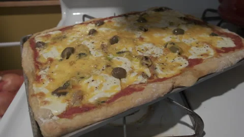 Rectangular homemade pizza with tomato sauce and cheese Stock Footage 330181248