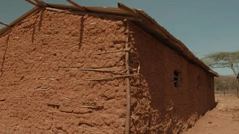 Rectangular house in savannah made of sticks and clay. African architecture is Stock-Footage 302882851