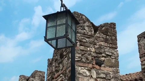 Rectangular lantern with broken glass on the background of blue sky Stock Footage 70923143