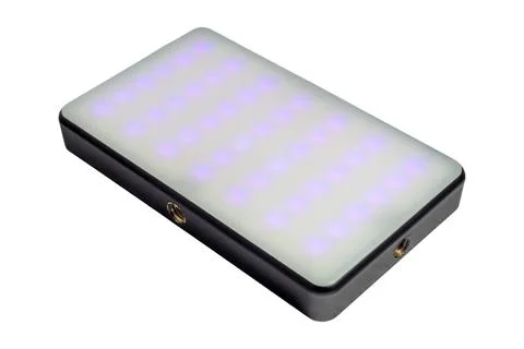 Rectangular LED light panel with frosted diffuser and violet illumination Stock Photos