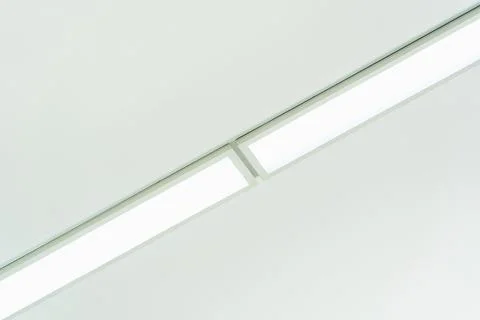 Rectangular LED lights on a white ceiling Stock-Fotos