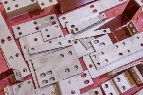 Rectangular metal plates with round holes. Stock Photos