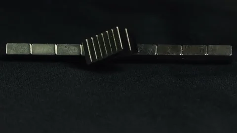 Rectangular Neodymium Magnet Snapping Together in Slow Motion 1500fps Copy Space Stock Footage 118115622