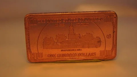 A Rectangular One Hundred Dollar Coin Rotating In A Clockwise Motion 스톡 동영상 129482841