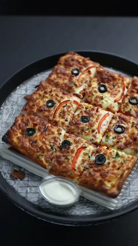 Rectangular pepperoni pizza with melted cheese and crispy crust Video stock 307058533