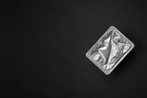 Rectangular plastic box with yogurt or cheese hermetically sealed with a fo.. Stock Photos
