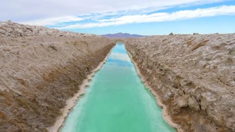 Rectangular Pool With Turquoise Water For Extraction And Production Of Salt Stock Photos