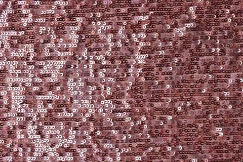Rectangular red shiny fabric with sequins closeup Stock Photos