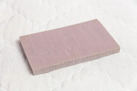 A rectangular sample of rubber foam 스톡 사진