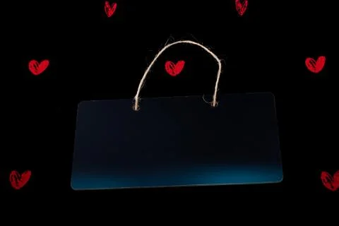 Rectangular shaped black notice board  and red hearts 写真素材