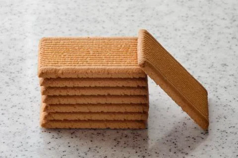 Rectangular shortbread cookies on a light marble top. Homemade baking. Stock Photos
