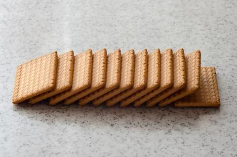 Rectangular shortbread cookies on a light marble top. Homemade baking. Stock Photos