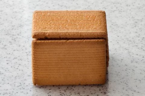 Rectangular shortbread cookies on a light marble top. Homemade baking. Stock Photos